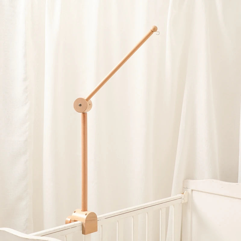 Support en bois articulé pour mobile bébé
